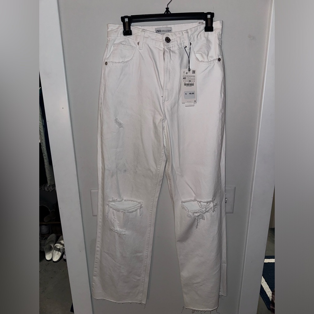 Zara wide leg white pants. Tags still on. Never worn